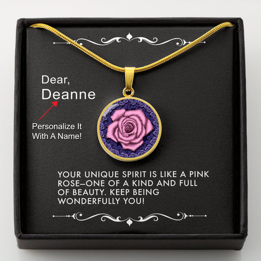 Gold necklace with a pink rose pendant in a box with a message card that can be personalized.