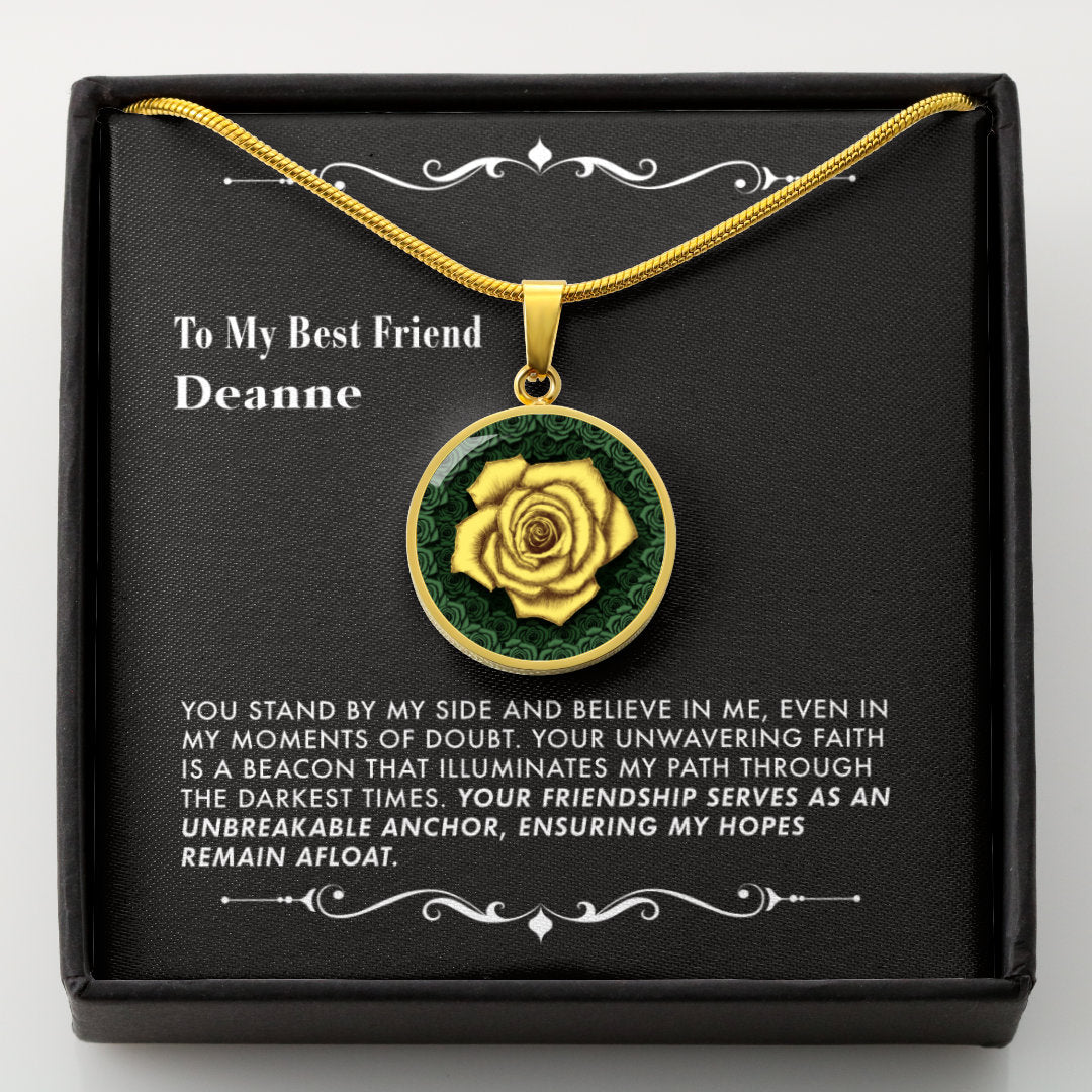 Necklace with a yellow rose pendant in a black gift box with a message card.