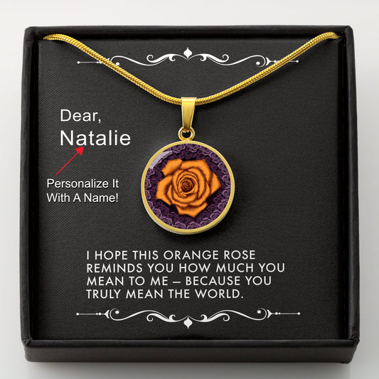 Gold necklace with an orange rose pendant in a box with a message card that can be personalized.