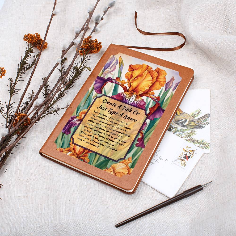 Notebook with a floral design on the cover, featuring text, orange, and purple irises.