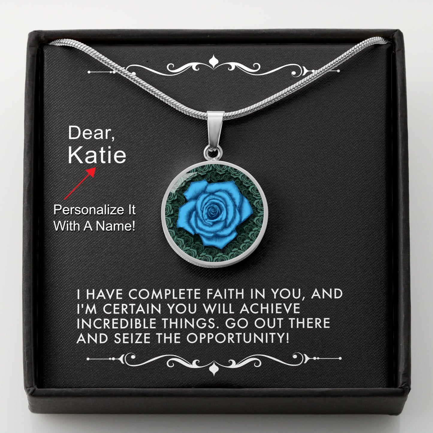 Silver necklace with a blue rose pendant in a box with a message card that can be personalized.