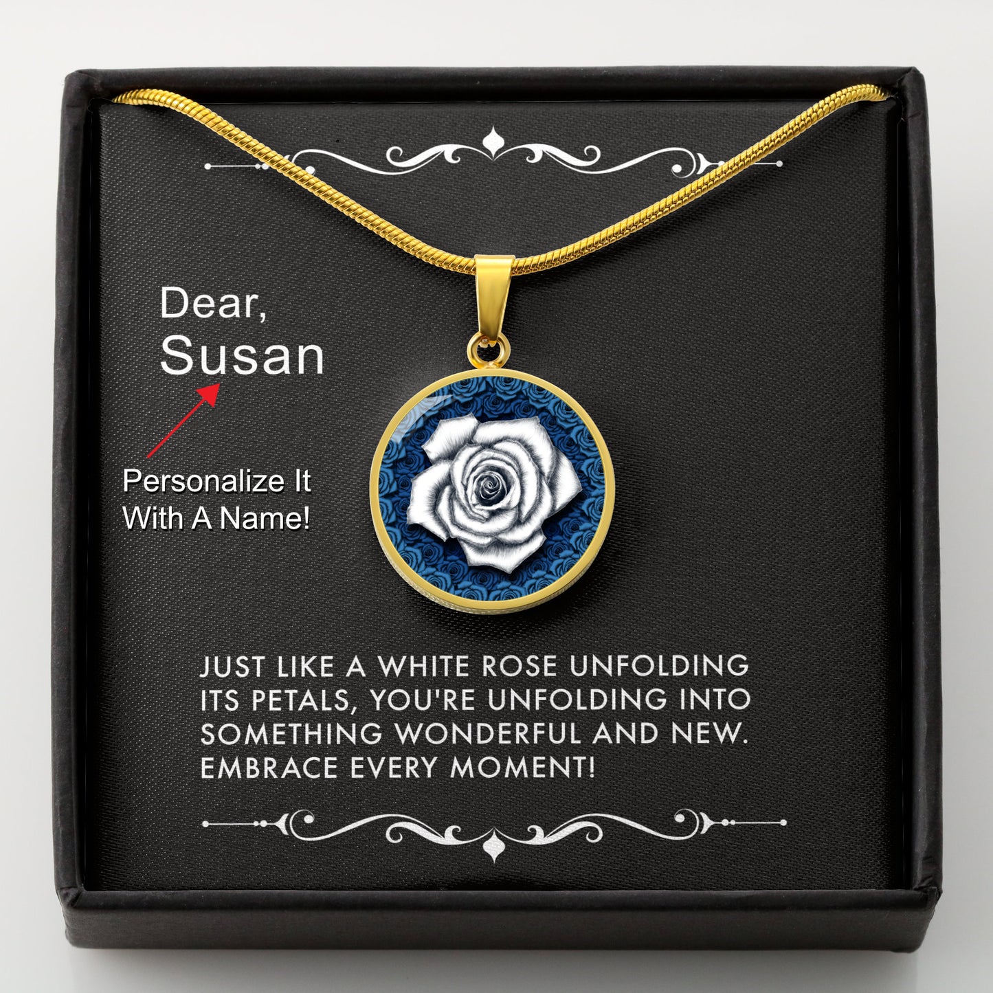 Gold necklace with a white rose pendant in a box with a message card that can be personalized.