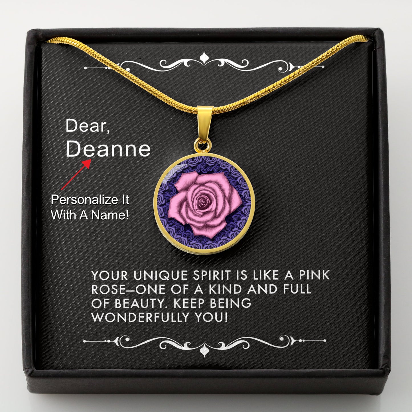 Gold necklace with a pink rose pendant in a box with a message card that can be personalized.