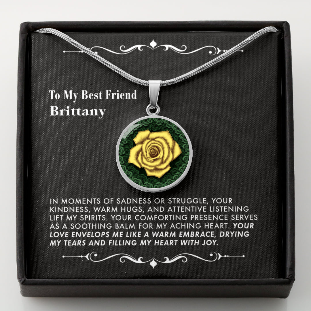 Necklace with a yellow rose pendant in a black gift box with a message card.