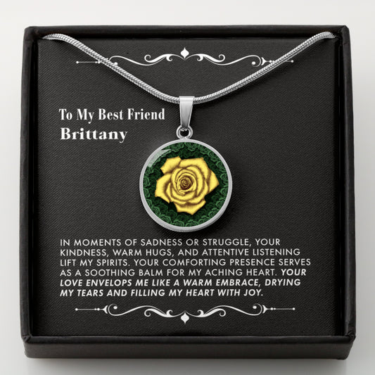 Necklace with a yellow rose pendant in a black gift box with a message card.