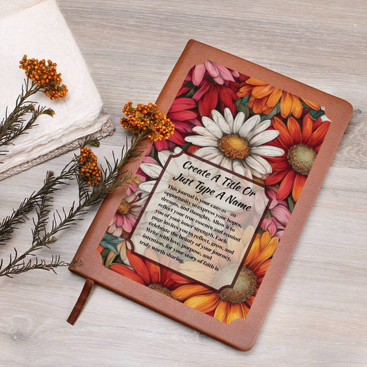 Colorful daisies on a vegan leather journal and text on a wooden surface.
