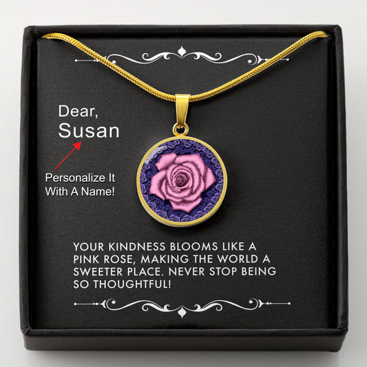 Gold necklace with a pink rose pendant in a box with a message card that can be personalized.