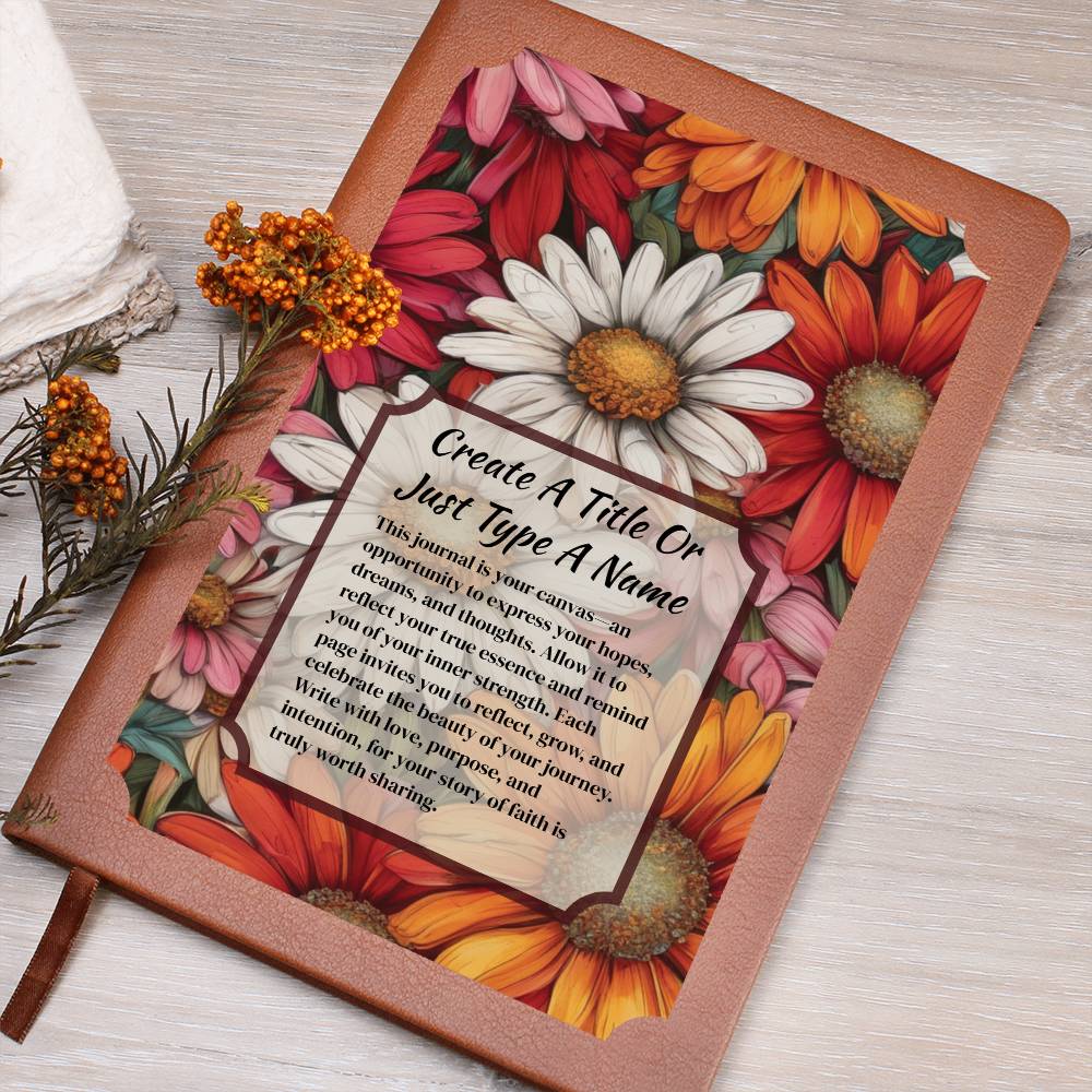 Colorful daisies on a vegan leather journal and text on a wooden surface.
