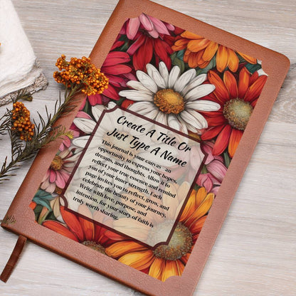 Colorful daisies on a vegan leather journal and text on a wooden surface.