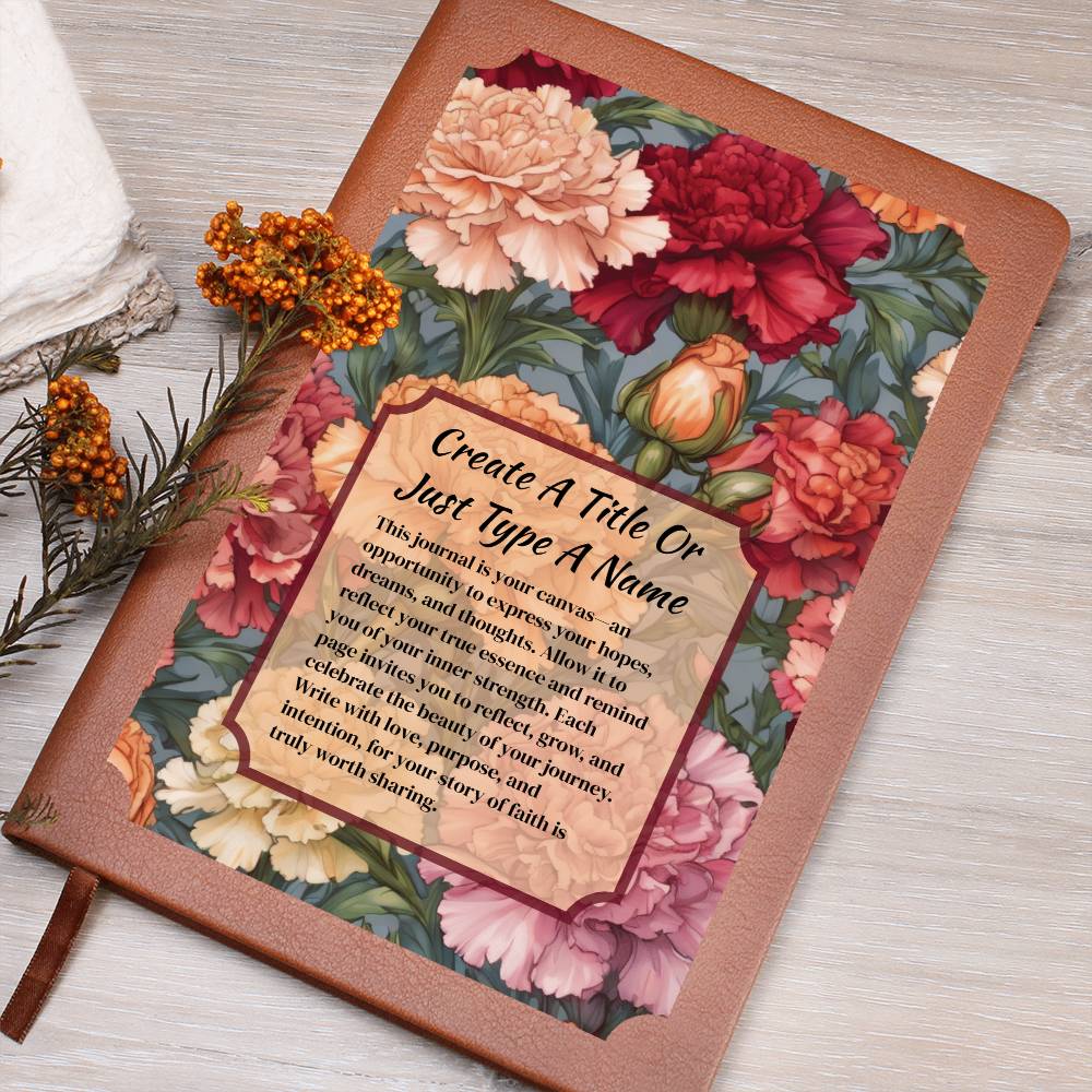 Colorful carnations on a vegan leather journal and text on a wooden surface.