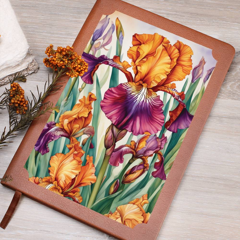 Notebook with a floral design on the cover, featuring orange and purple irises.