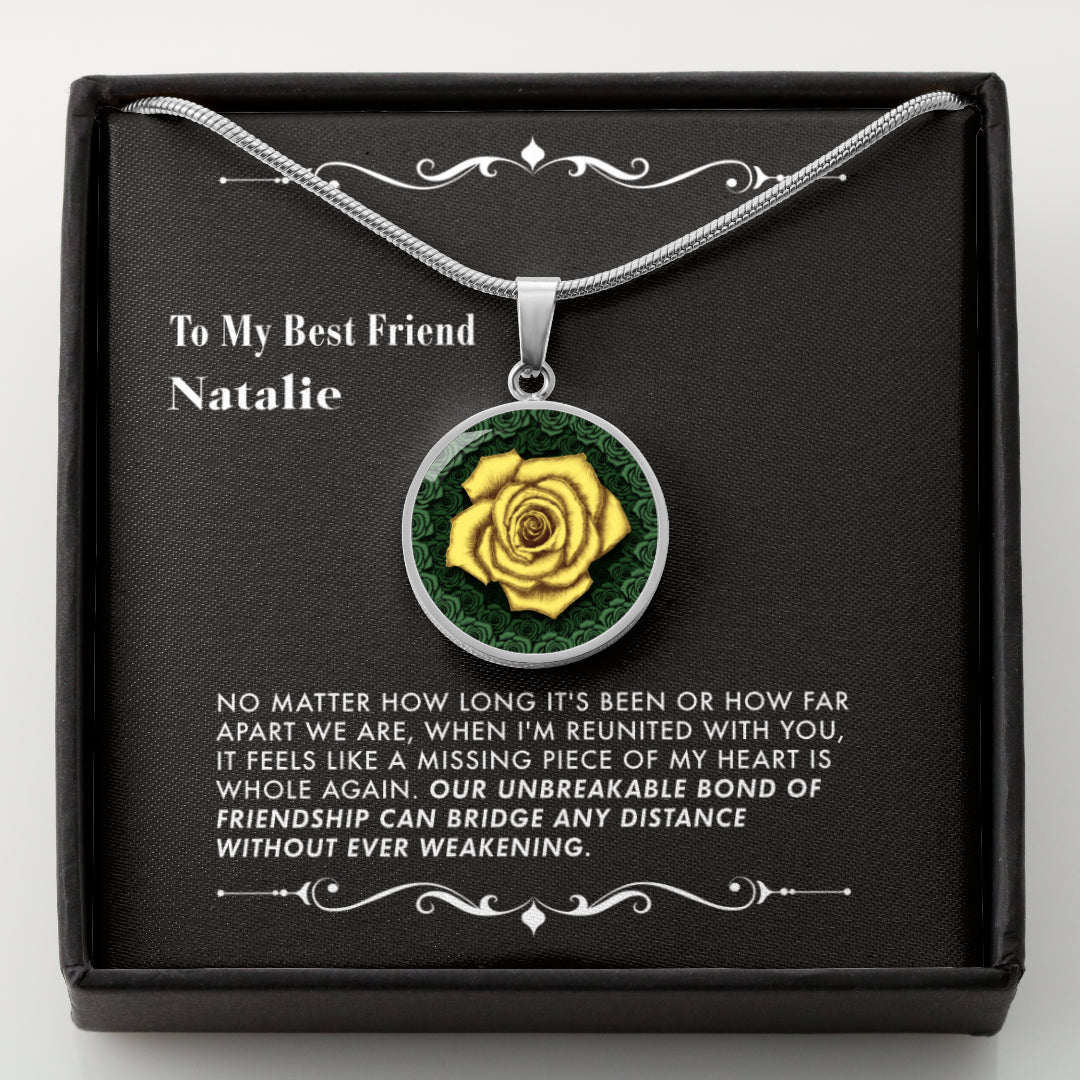 Necklace with a yellow rose pendant in a black box with a personalized message card.