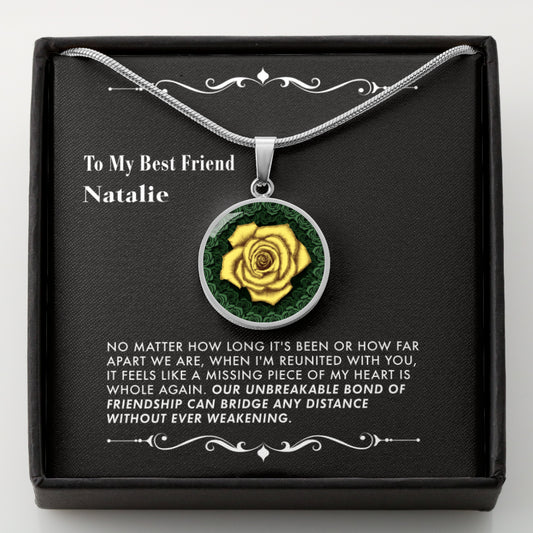 Necklace with a yellow rose pendant in a black box with a personalized message card.