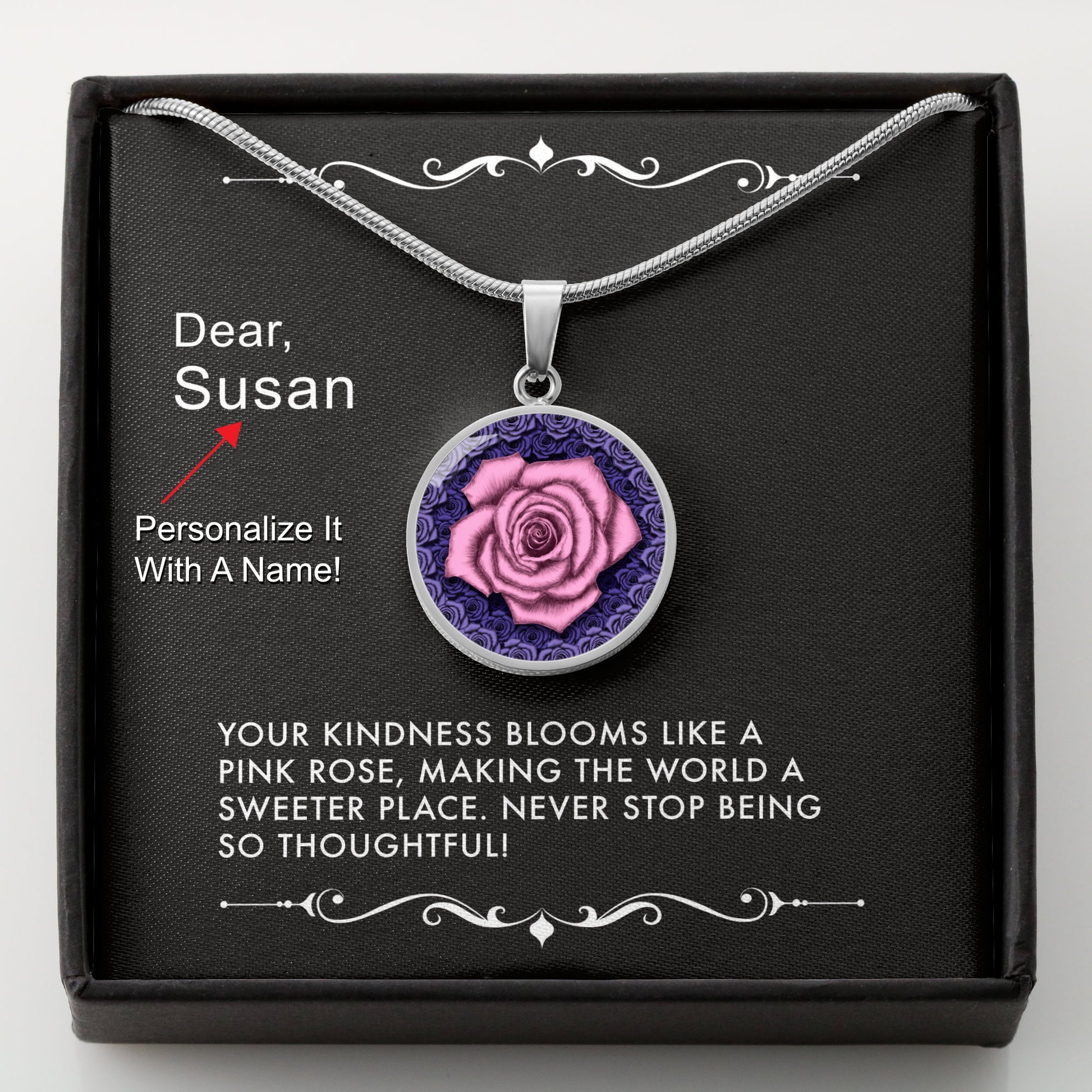 Necklace with a pink rose pendant in a box with a message card that can be personalized.
