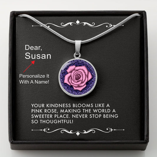 Necklace with a pink rose pendant in a box with a message card that can be personalized.