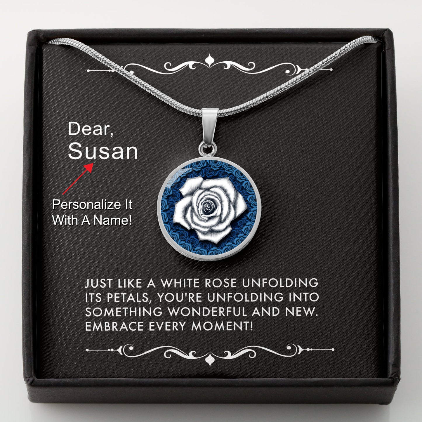 Silver necklace with a white rose pendant in a box with a message card that can be personalized.