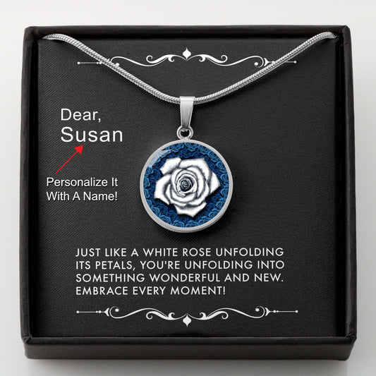 Silver necklace with a white rose pendant in a box with a message card that can be personalized.