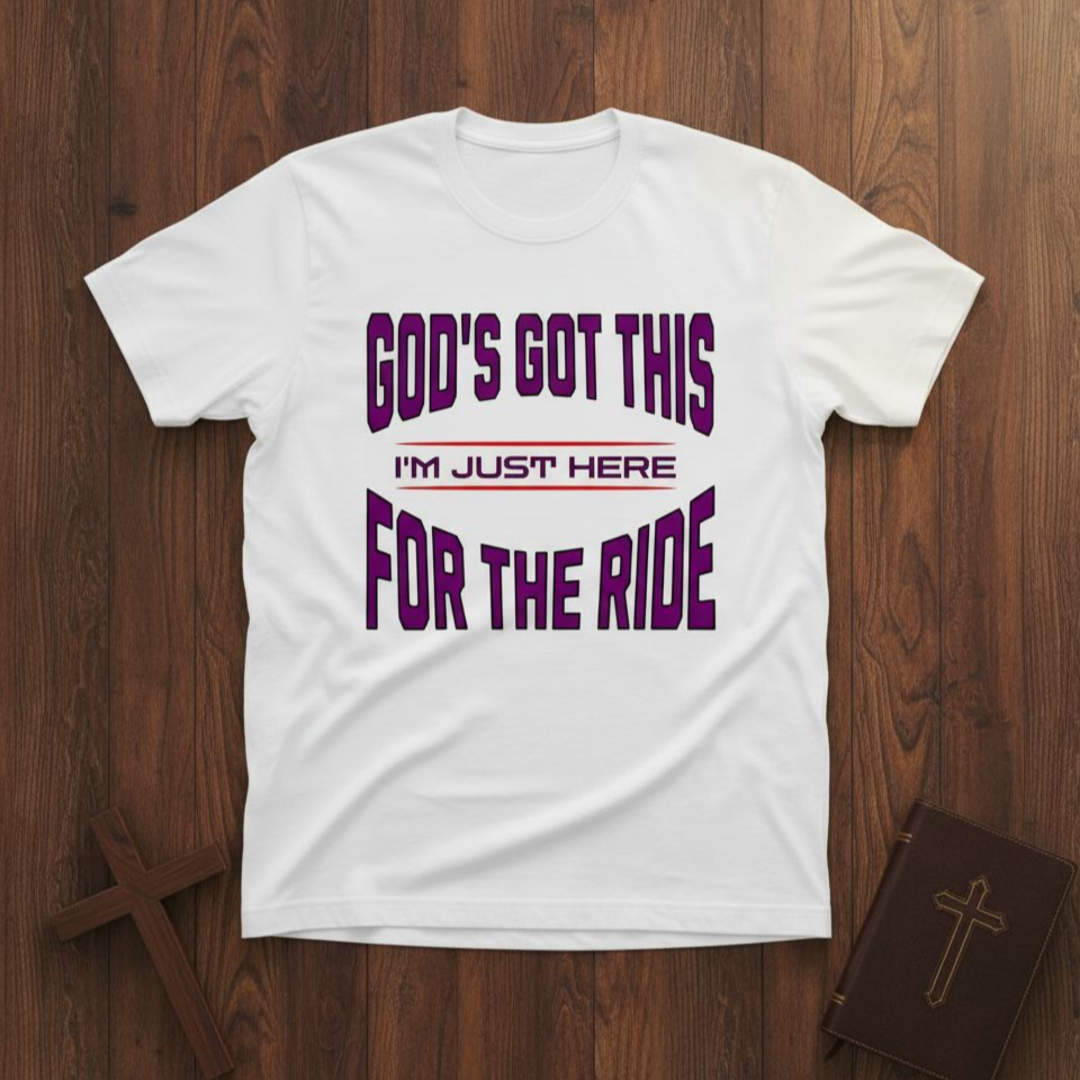 White t-shirt with motivational quote on a wooden surface