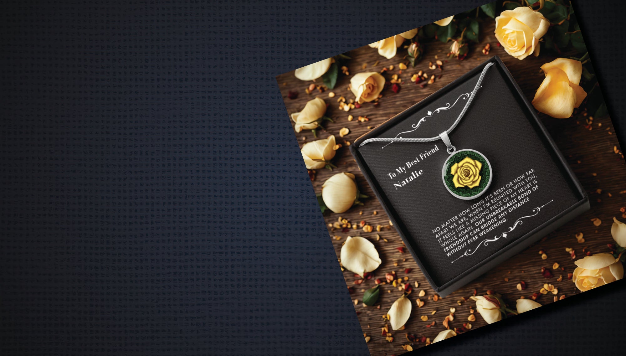 Necklace with a yellow rose design pendant on a dark surface with yellow rose petals.