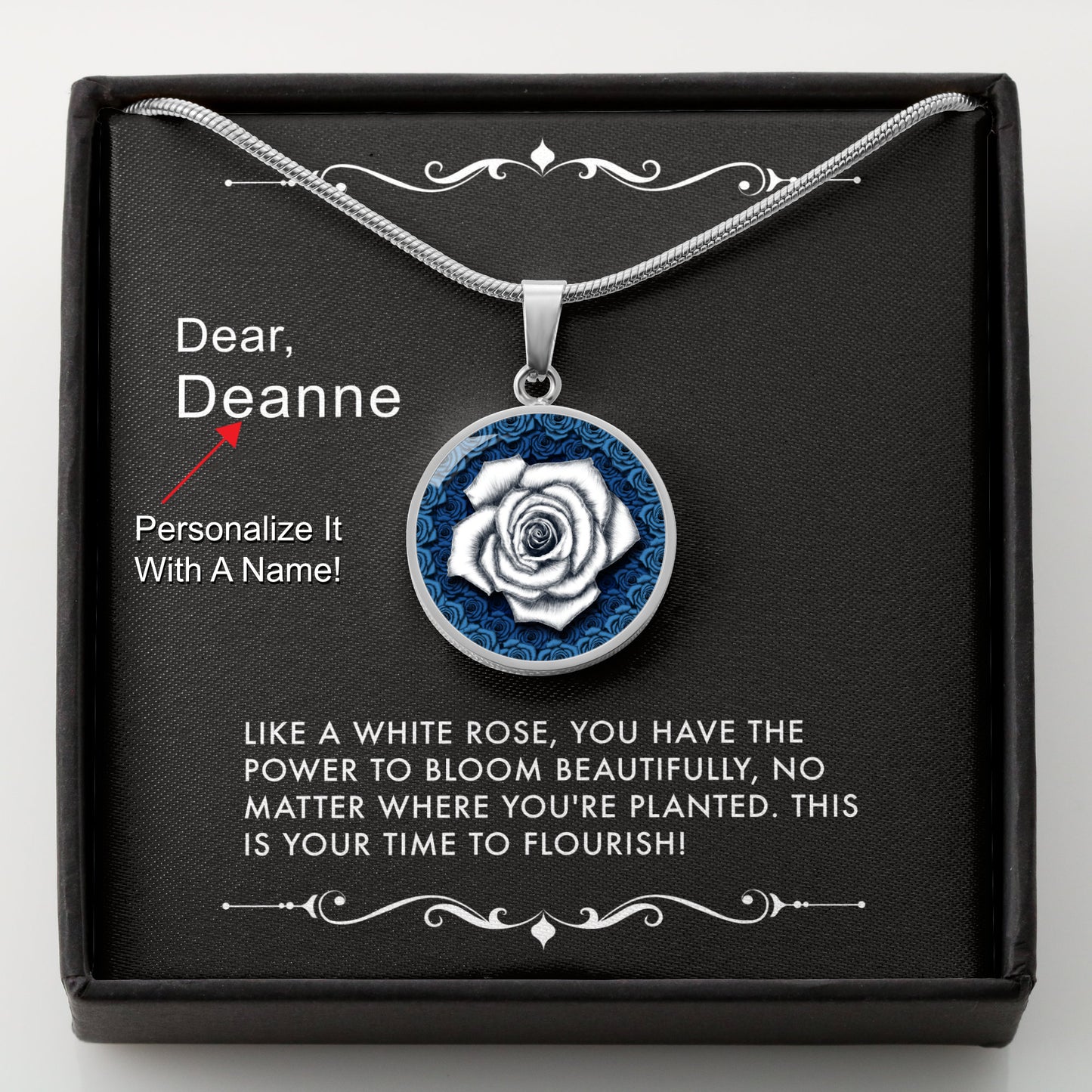 Silver necklace with a white rose pendant in a box with a message card that can be personalized.