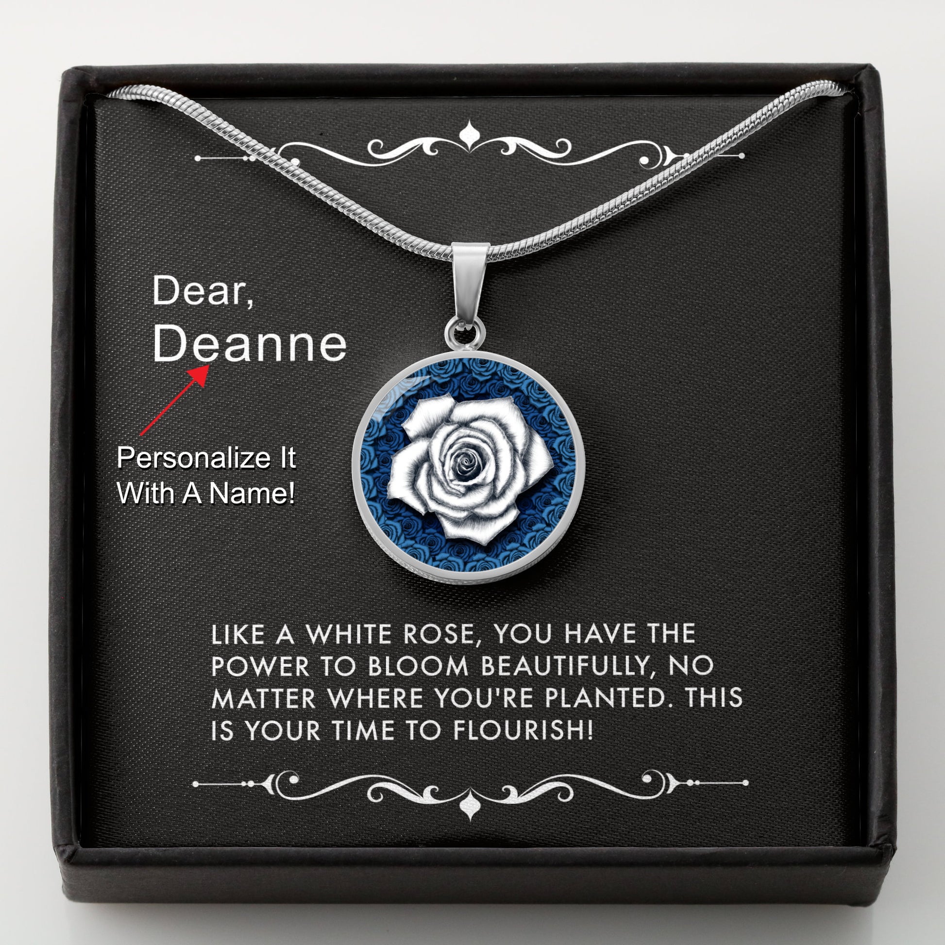Silver necklace with a white rose pendant in a box with a message card that can be personalized.