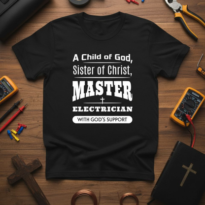 Black t-shirt with white text on a wooden surface with tools and religious items.