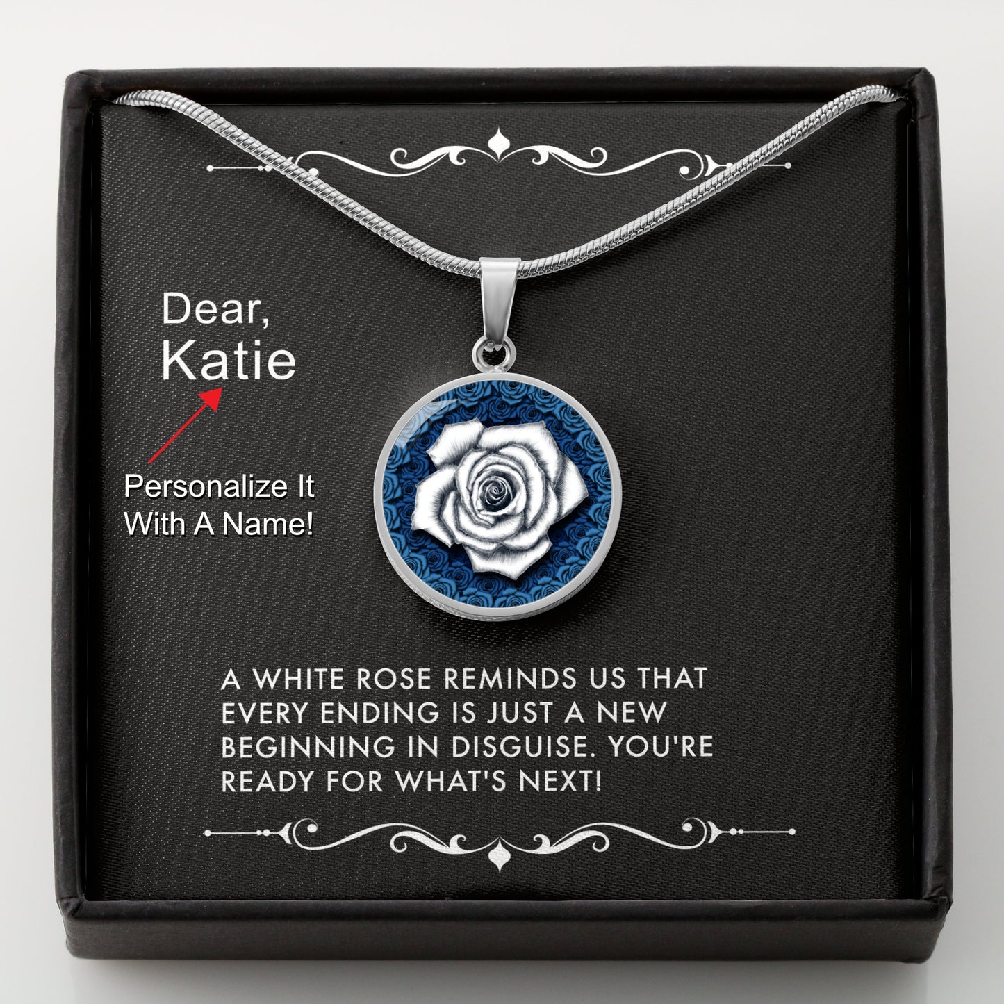 Silver necklace with a white rose pendant in a box with a message card that can be personalized.