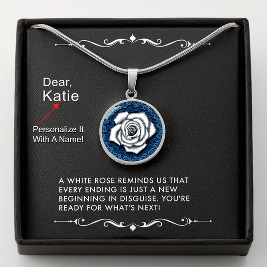 Silver necklace with a white rose pendant in a box with a message card that can be personalized.