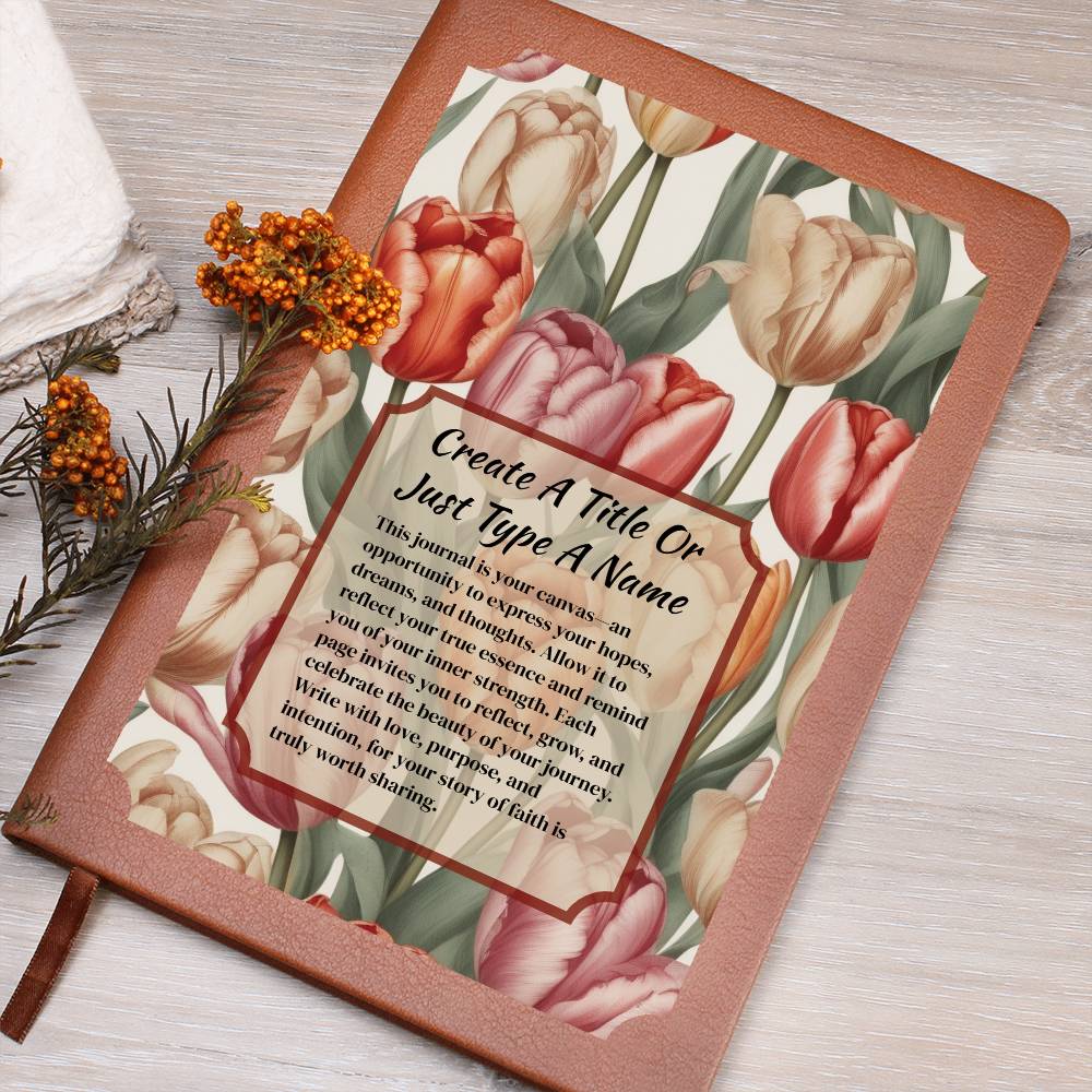 Vegan leather journal with a floral design on the cover, featuring text, red-orange, and pink tulips.