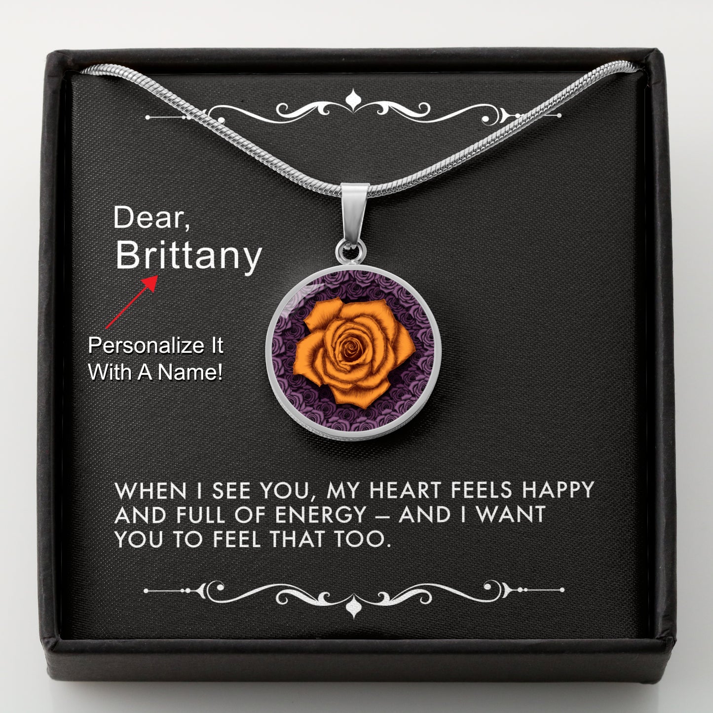Silver necklace with an orange rose pendant in a box with a message card that can be personalized.