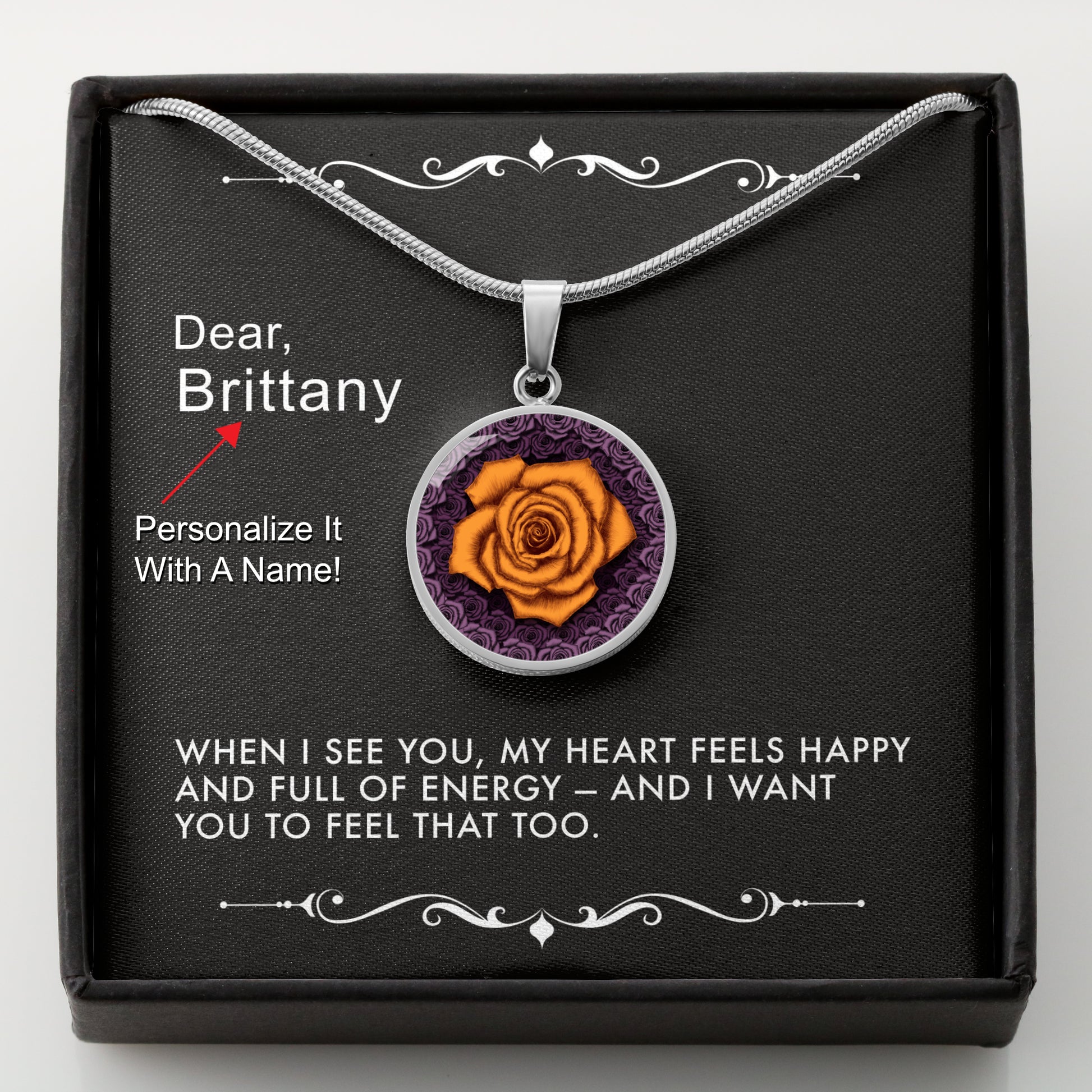 Silver necklace with an orange rose pendant in a box with a message card that can be personalized.