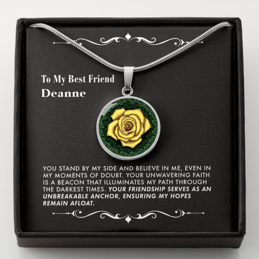 Necklace with a yellow rose pendant in a black gift box with a message card.