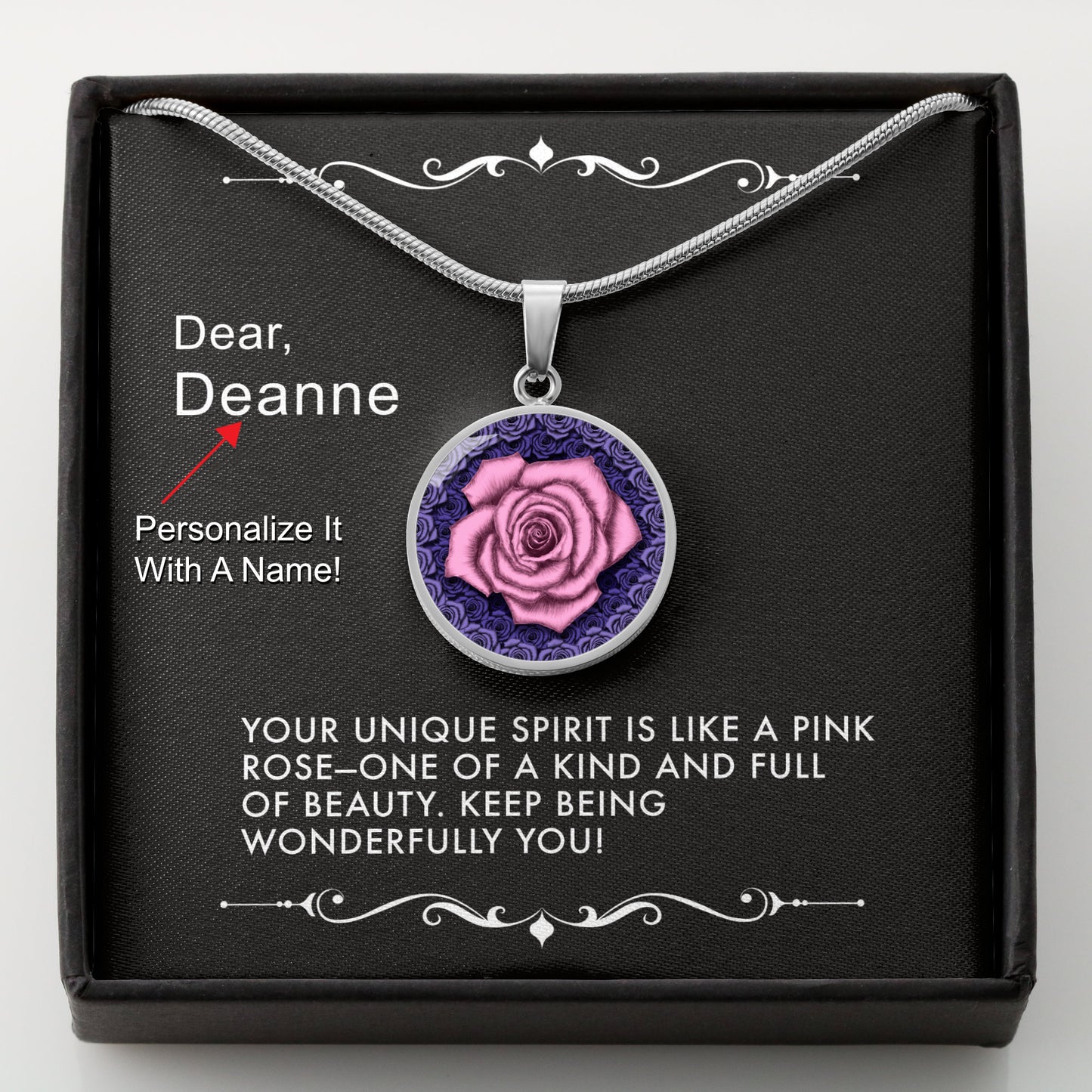 Silver necklace with a pink rose pendant in a box with a message card that can be personalized.
