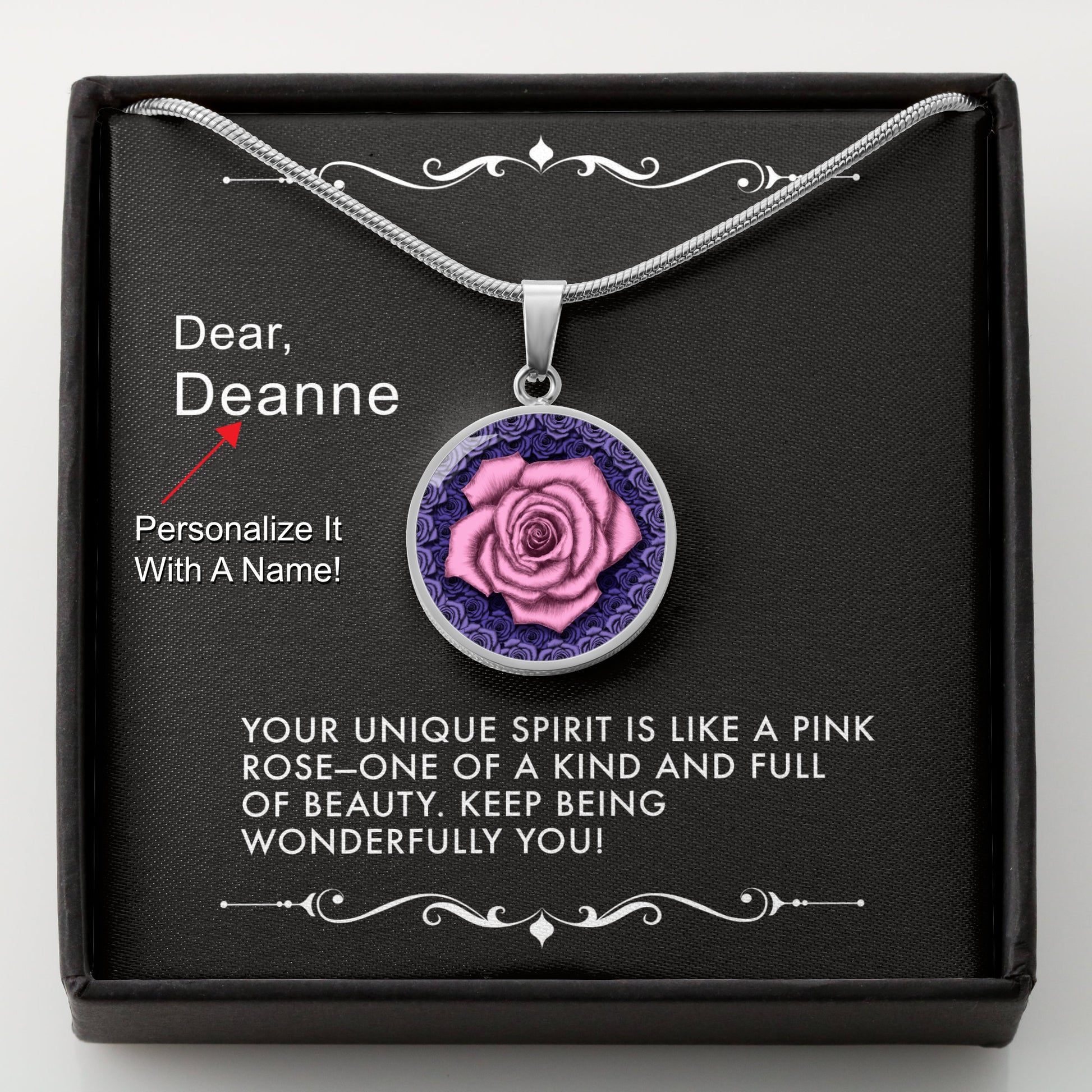 Silver necklace with a pink rose pendant in a box with a message card that can be personalized.